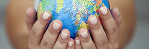 Woman holding globe ESG 300 by 100